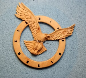 Adler mit Uhr